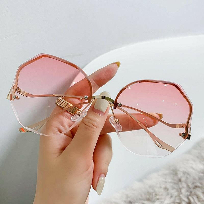 Curved Rimless Sun Glasses 